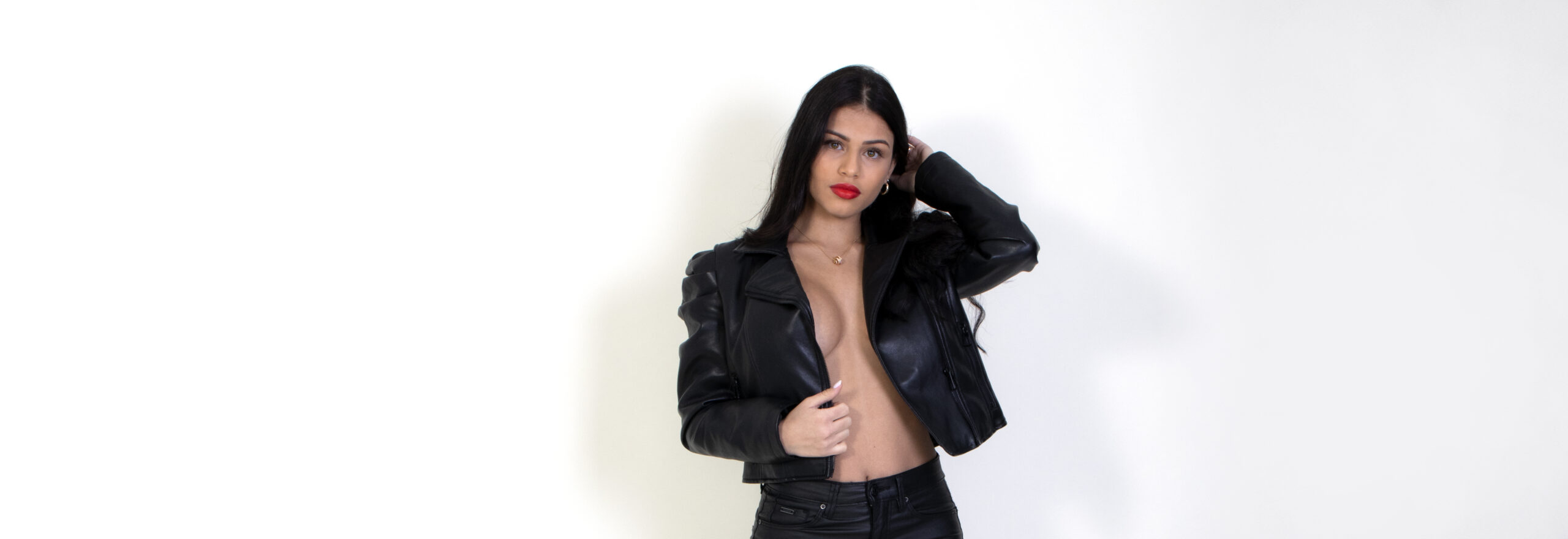 Latin model Stephanie posing in black for Costapix