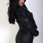 Latino venezuelan model Stephanie in black leather pants and jacket in Costapix Studio